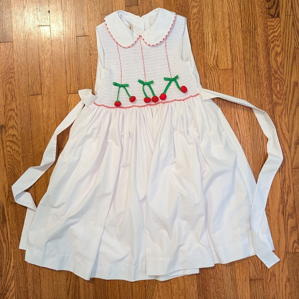 Charming White Kids Smocked Dress with Cherry Accents